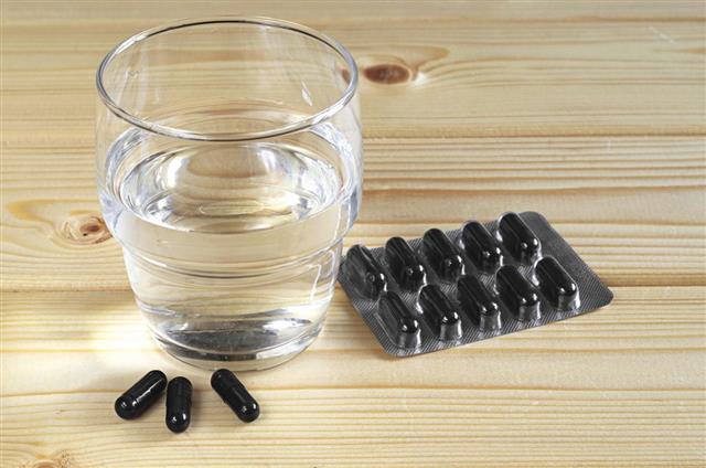 Activated charcoal and water