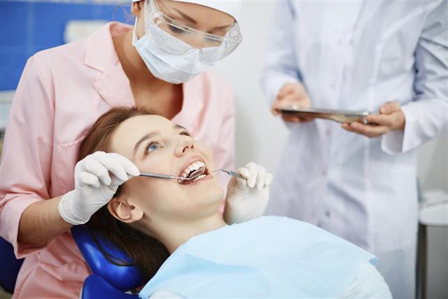Girl in dentist clinic
