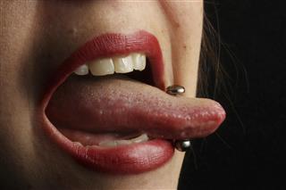 Pierced Tongue Licking Lips