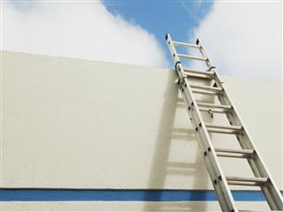 Extension Ladder leaning on building