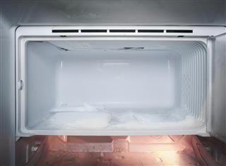Refrigerator with ice Frozen in fridge