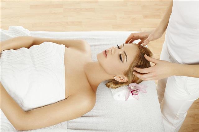 Beautiful young woman having massage