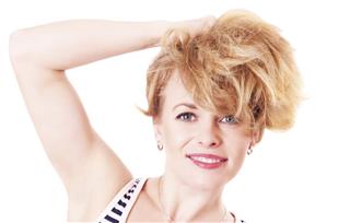 Cheerful funny woman with shaggy hair