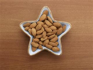 Roasted Almonds In A Star Plate