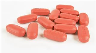 Ibuprofin Red Pills on White