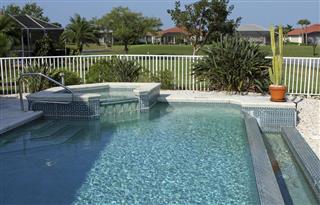 Backyard swimming pool and hot tub in Florida