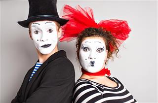 Street artists performing Two mimes man and woman in april