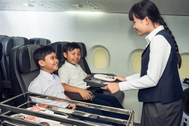 Little stewardess and passengers