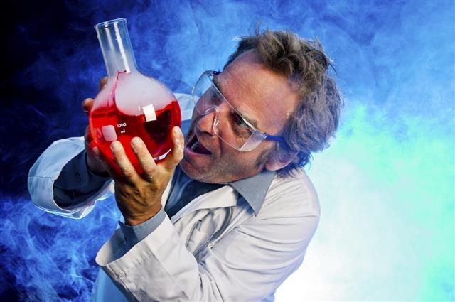 A mad scientist with red potion in his blue lab