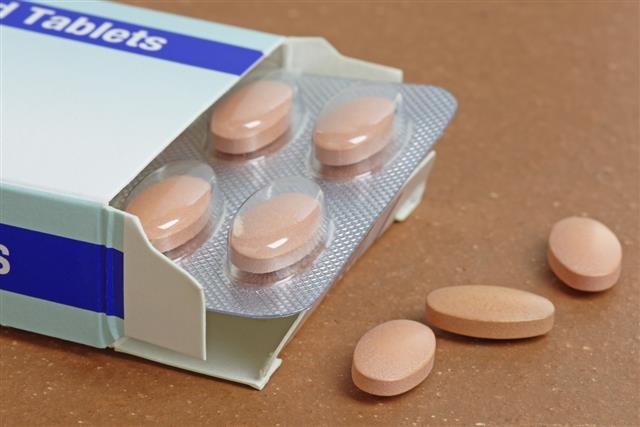 Statins or Generic Tablets in Close Up with a Packet