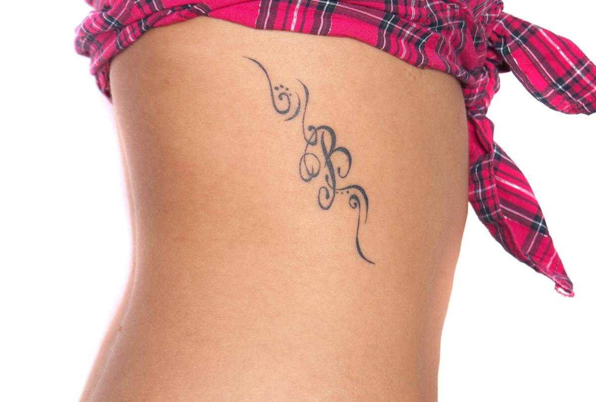 Rib Tattoos for Girls 50 Best Side Tattoo Ideas for Ladies