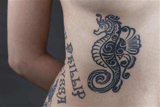 Seahorse on Ribs Tattoo