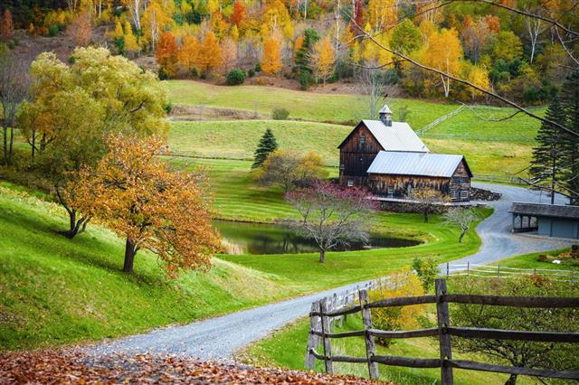 New England countryside farm in autumn landscape