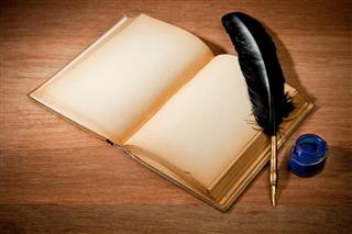 Old Book With Quill Pen