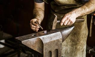 Blacksmith working on a anvil
