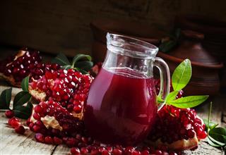 Pitcher with fresh pomegranate juice