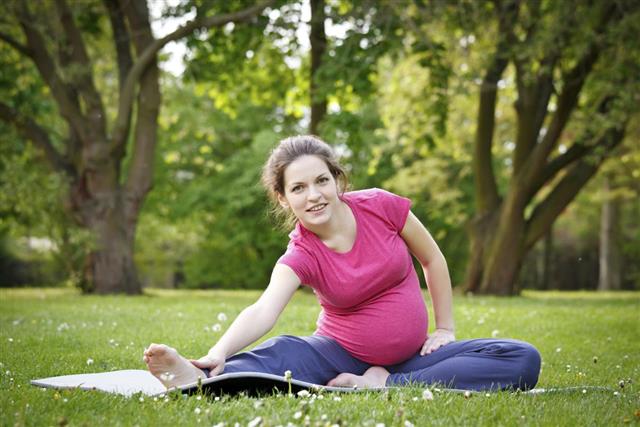 Pregnant woman in the park