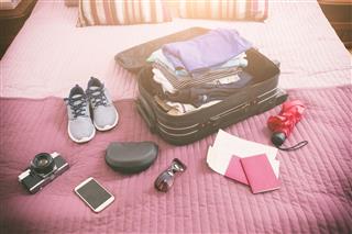 Luggage With Clothes And Other Items