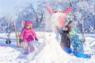 Children Having Fun In Winter