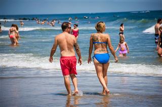 Tattoo Couple On Beach
