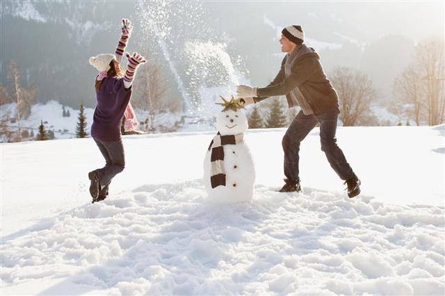 Couple Making Snowman