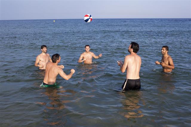 Five Adult Men Playing