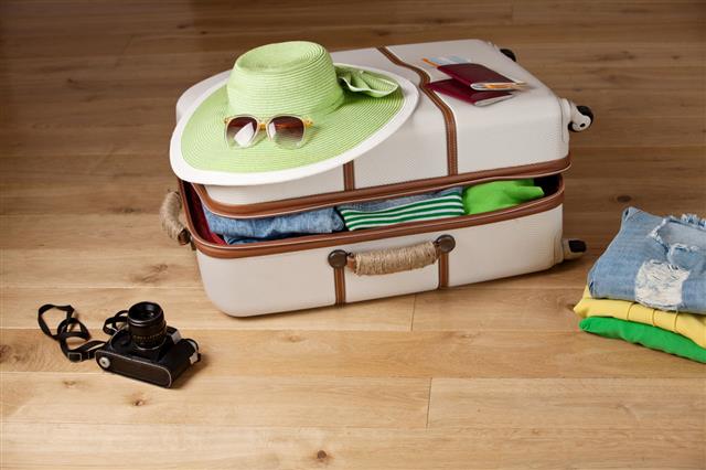 Suitcase On A Wooden Floor