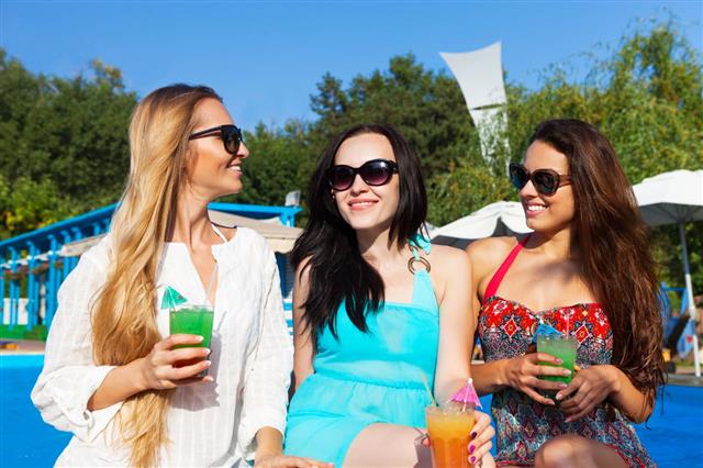 Girls With Beverages On Summer Party