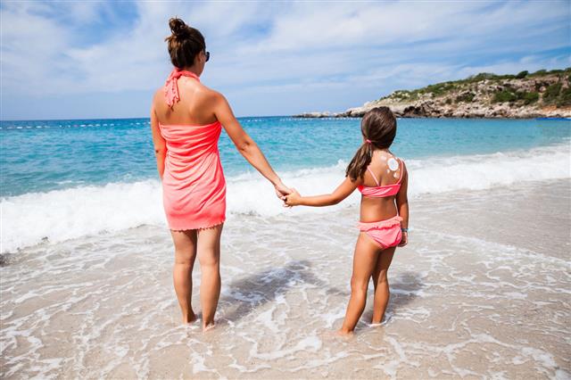 Mother And Daughter On A Beach Vacation