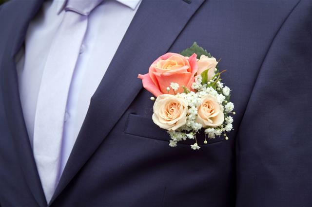 Grooms Boutonniere Of Roses