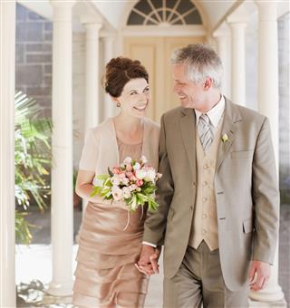 Mature Bride And Groom Smiling