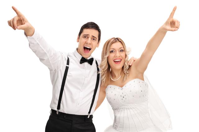 Joyful Bride And Groom Singing Together