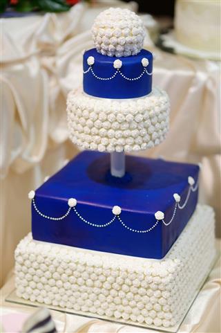 Blue Wedding Cake Decorated With Flowers