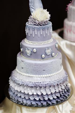 Blue Wedding Cake Decorated With Flowers