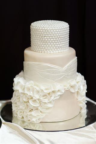 Wedding Cake Decorated With White Pearls