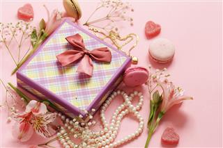 Gift Box With Jewelry Flowers And Macaroons