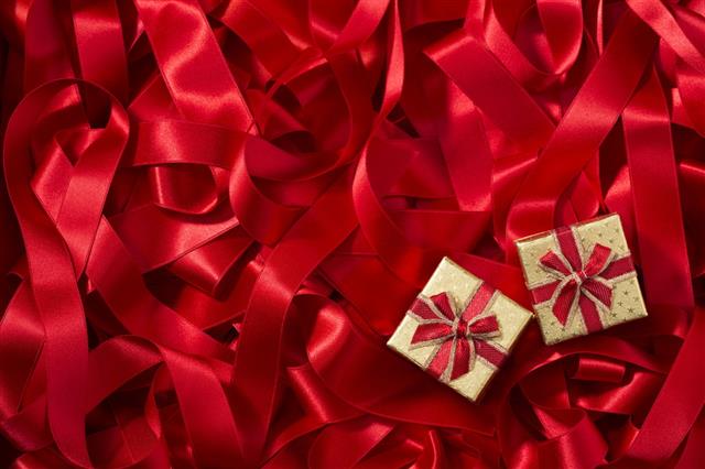 Red Ribbon Background With Gifts