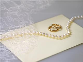 Wedding invitation with a pearl