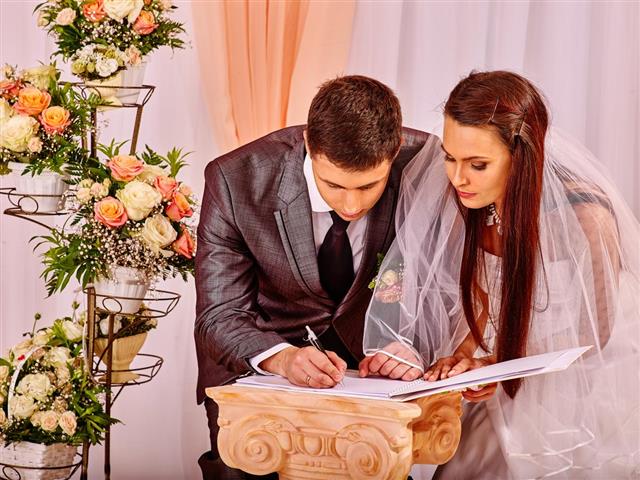Groom and bride register marriage