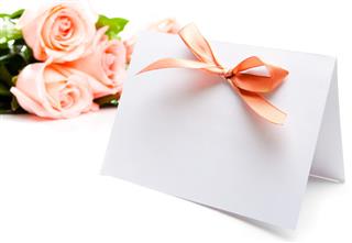Invitation card and roses