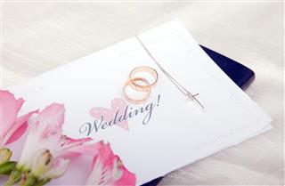 Wedding rings in invitation card