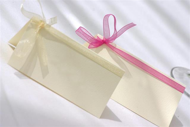 Two blank wedding name cards