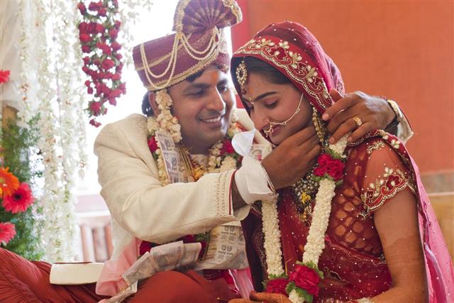 Happy Indian couple at their wedding