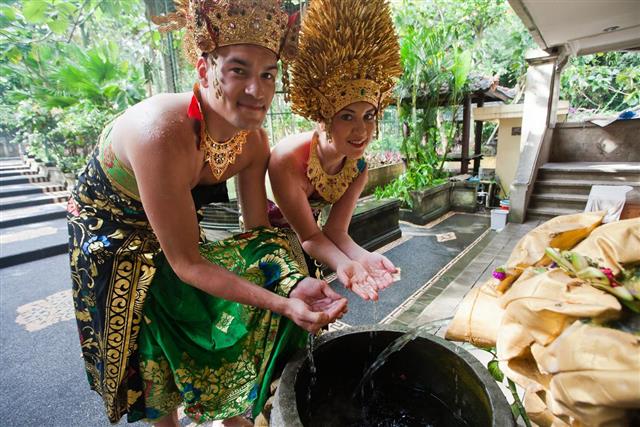 Couple at honeymoon in Balinese tradition
