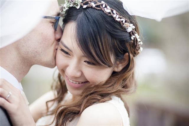 Asian Woman and Caucasian Man Wedding