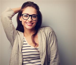 Happy Young Woman In Glasses