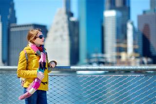 Woman Sightseeing By Brooklyn Bridge