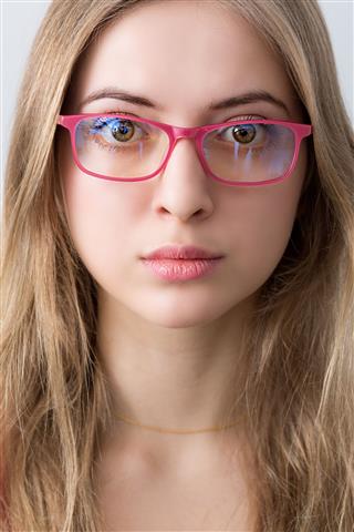 Young Woman With Pink Glasses