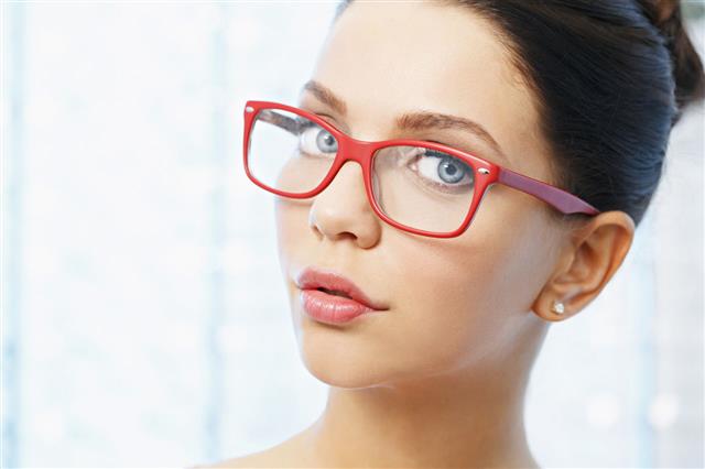 Young Woman Chooses Glasses
