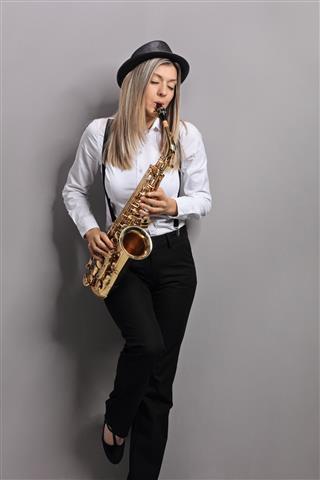 Young Woman Playing Saxophone